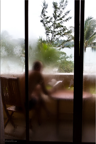 man window indonesia reading view balcony foggy resort bintan earthasia ursulasweeklywanders