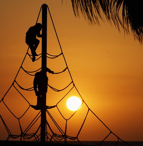 light sunset sea sky people sun silhouette spain andalucia palm cadiz climbingframe