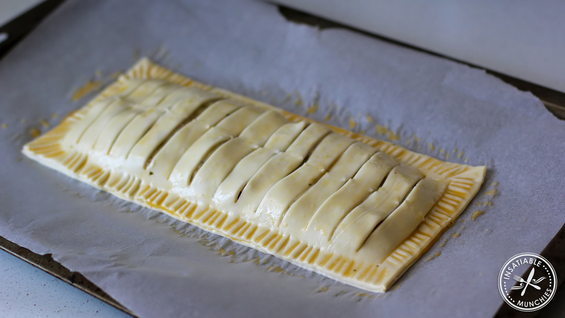 Brush the sealed pie with egg before putting the pie in the oven. 