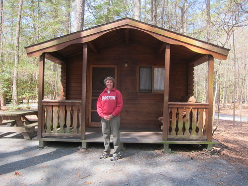 Mom in front of the cabin