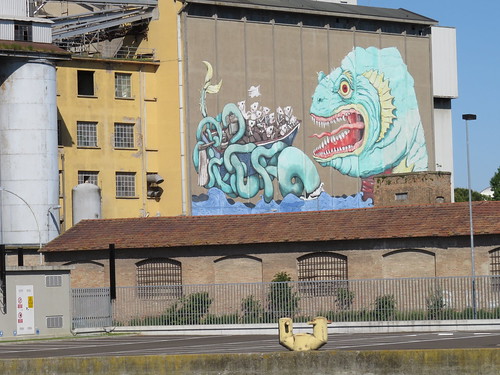 Mural by Erica il Cane & Gabo in 2012