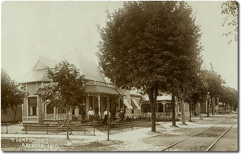 houses people woman usa man men history boys kids fence buildings walking children awning women indiana streetscene transportation pedestrians interurban residential arcadia hamiltoncounty realphoto hoosierrecollections