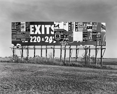 blackandwhite film 4x5 viewcamera interstate80 i80 road highway interstate freeway sign billboard advertisement iowa country midwest