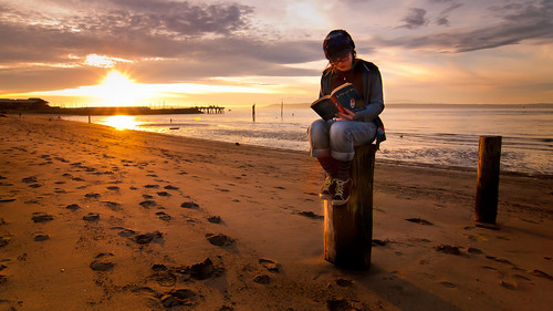 sunset beach girl sunshine reading pier washington sand dusk pugetsound lowtide ruth edmonds