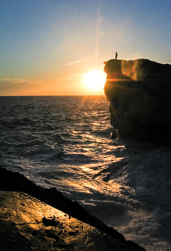 ocean morning cliff sun water sunrise person rocks waves bahamas eleuthera