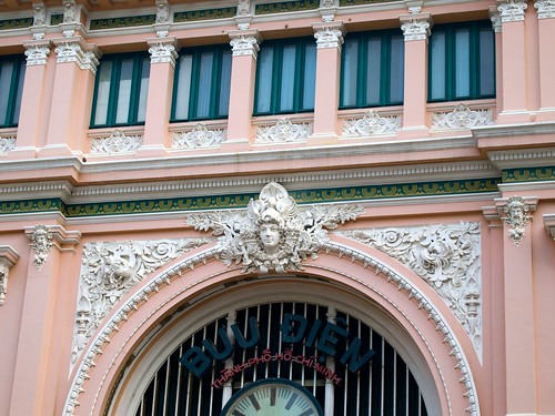 A Carve above the gate of Saigon Central Post Office