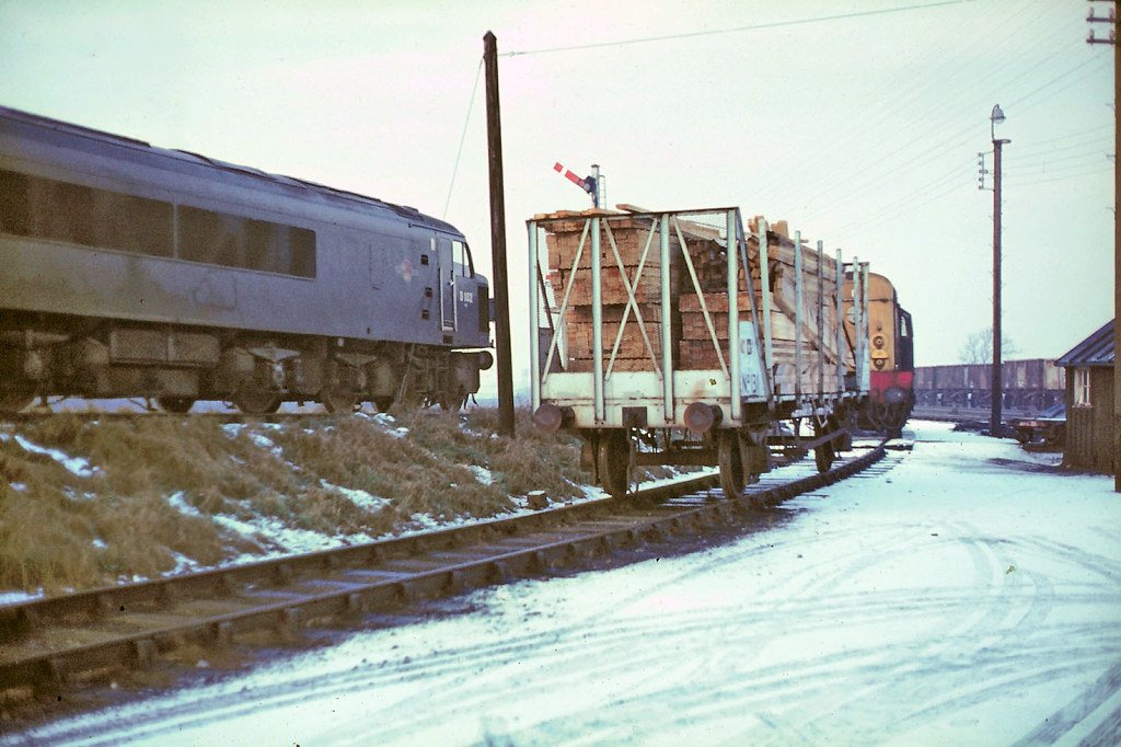 a Belvoir Junction  Class 45 D102 in plain green iron ore coming off banch Dec 68J1518