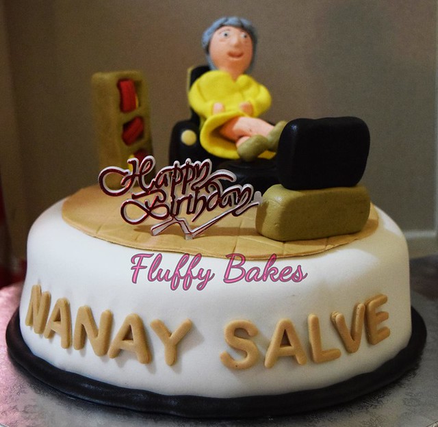 8-inch fondant cake with edible 3D grandma toppers by Fluffy Bakes