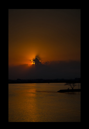 sunset red sun india lake black reflection tree water beautiful silhouette clouds bench landscape 50mm twilight nikon waves wind hyderabad waterscape goldenlining d3000