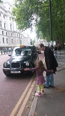 Transport number 4-hailing an iconic black cab over to Covent Garden