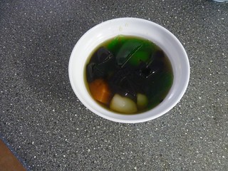 grass jelly dessert with longan rambutan and papaya