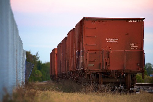 sunset abandoned train rust boxcar cubes chainlinkfence lowangle project365 12365