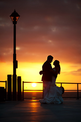 wedding sunset lamp silhouette groom bride pier evelyn jimmy redondobeach