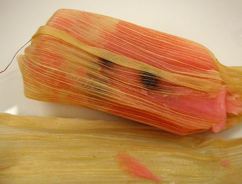 a sweet tamal about to be unwrapped