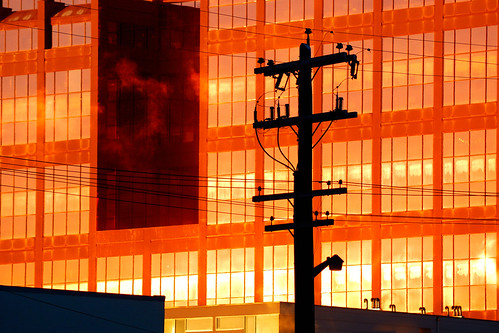 orange silhouette sunrise edmonton powerpole canadaplace