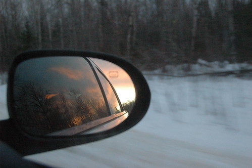 sunset car mirror view
