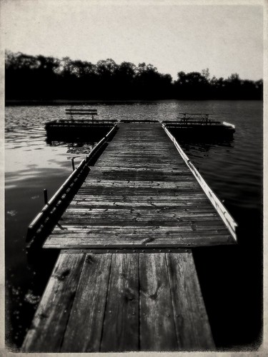 wood blackandwhite bw lake water dark bench pier woods deck flare picnictable sklender