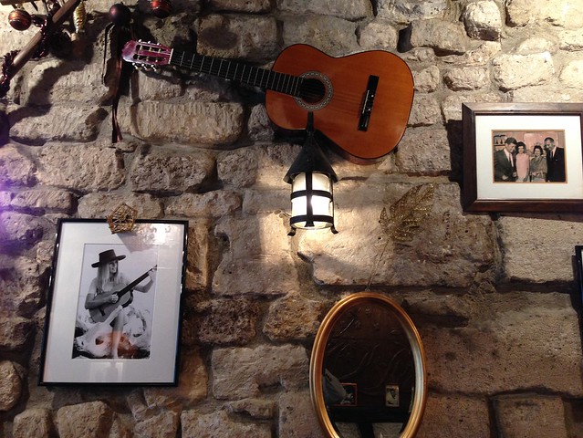 Guitar on the wall of la Maison Verlaine in Paris
