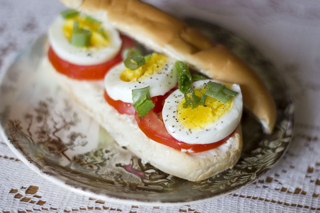 Egg, tomato and green onion sandwich