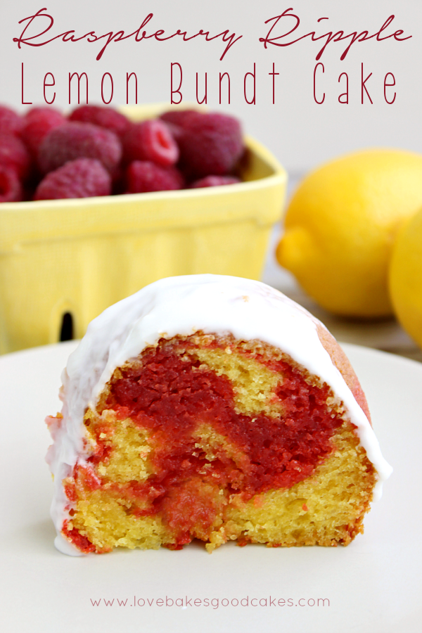 Raspberry Ripple Lemon Bundt Cake on a plate with fresh fruit.