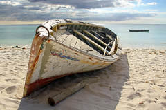 Mauritius - old battered boat on the beach 5
