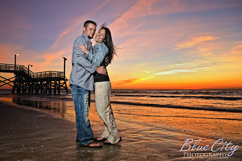 pictures ocean sky orange beach gulfofmexico water clouds portraits sunrise coast pier engagement sand couple texas photos shots tx young freeport engaged lakejackson quintana brazoriacounty bluecityphotography bluecityphotographycom