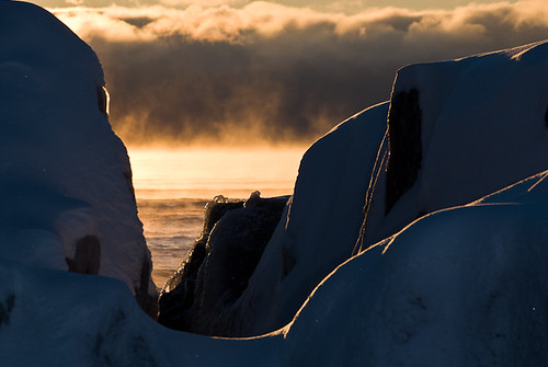 winter usa ice minnesota sunrise mn grandmarais seasmoke artistspoint iceformation rockscoatedwithice