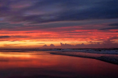 sunset beach water ocean daytona florida colors sky clouds reflection