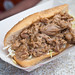 Cajun Duck Po'boy , saucy, tasty duck with tangy coleslaw. An unusual but unforgettable choice.(Food 1)