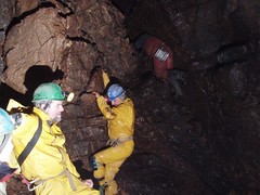 Helen Stalker and Nick watching Kevin and Sean traverse round the main chamber of Longwood Image