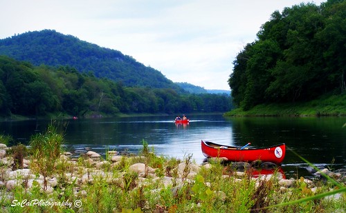 trees red sky plants mountains nature water grass clouds forest reflections river landscape boats woods rocks pennsylvania scenic pa canoes poconos delaware canoeing bushes waterscape newvision flickrdiamond worldwidelandscapes artistoftheyearlevel3 peregrino27newvision