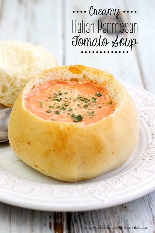 Easy Cooking with Slow Cooker Creamy Italian Parmesan Tomato Soup bowl on a white plate with a spoon.