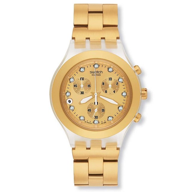 reloj swatch dorado