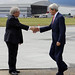 Secretary Kerry Is Greeted By Acting Deputy Chief of Mission Tokola