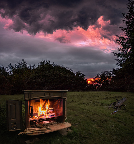 trees sunset sky holland netherlands dutch grass clouds garden fire mood lawn dramatic surreal atmosphere burning stove shrub crayfish surrealistic woodstove goudriaan rivierkreeft