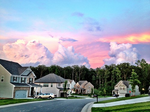 road street houses sunset sky house clouds neighborhood magnoliagreen plannedsubdivision