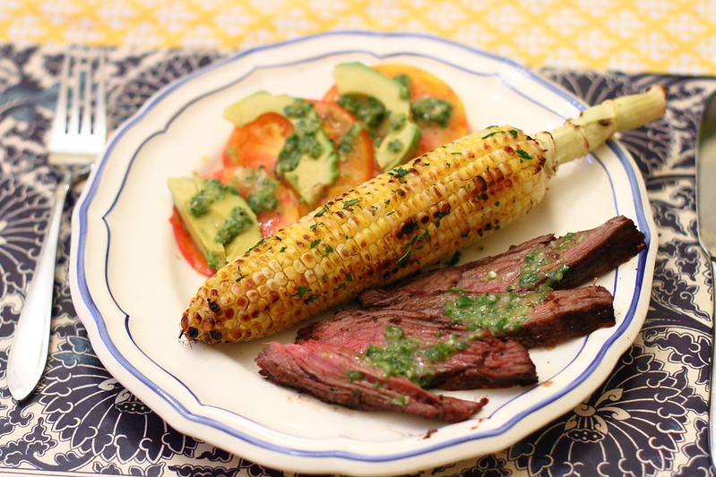 Sunday Dinner: Grilled Skirt Steak with Chimichurri, Grilled Corn, and Tomato and Avocado Salad