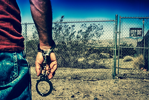 portrait cats mountain mountains sign rock metal cat self vintage fence lost sand nikon gate escape hand desert arm bokeh side gritty chainlink criminal worn wrist d200 bluejeans hdr handcuffs keepout lotsofthem hff breakfree fencefriday ourdailychallenge fencedfriday twittertuesday hbmike2000