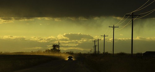 morgancounty colorado nature landscape road dirtroad car pole clouds horizon dust