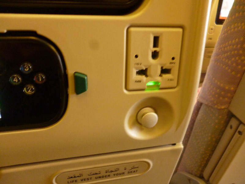 Electrical plugs on Emirates plane.