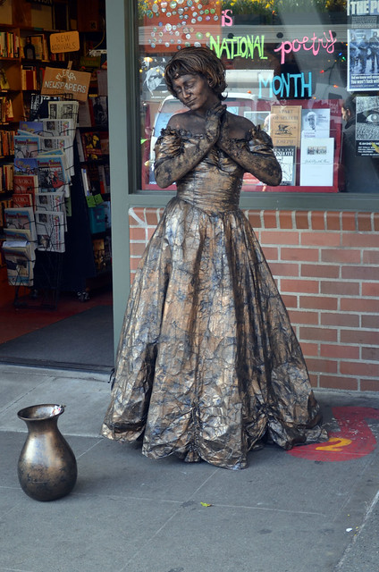 A street performer pretending to be a statue.