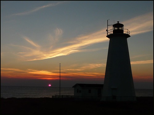 sunset lighthouse silhouette newfoundland ribbet capeanguille lighthousetrek clichesaturday