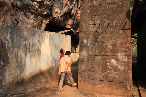 a blast wall in front of the cave entrance
