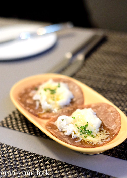 Rye taco with sticky rice, egg butter, sour onions and chives at Cafe Paci, Darlinghurst