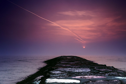 pink sea sun clouds sunrise rocks nuvole mare waves purple violet trails disk viola hue onde porpora scie