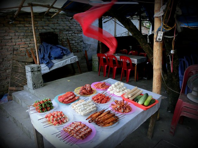 Keeping flies away from the food in Sapa, Vietnam