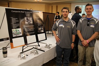 Composite Rear Suspension—SAE BajaTeam posing with poster