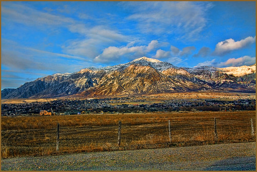 road houses mountain mountains clouds photoshop fence buildings landscape town utah ut wasatch artistic scenic vista layers pastures picturesque benlomond hdr wasatchfront postprocessing pleasantview tonemapped adjustmentlayers snowclad singleimagehdr topazlabsadjust topazlabsdenoise