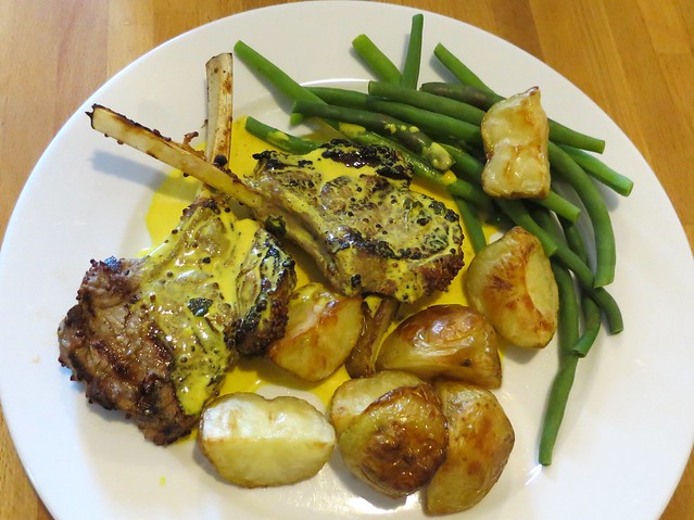 Lamb popsicles with roast potatoes and green beans