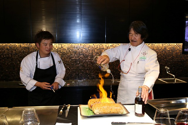 Sakai flambeing the Japanese Premium Wagyu Beef Wellington Style